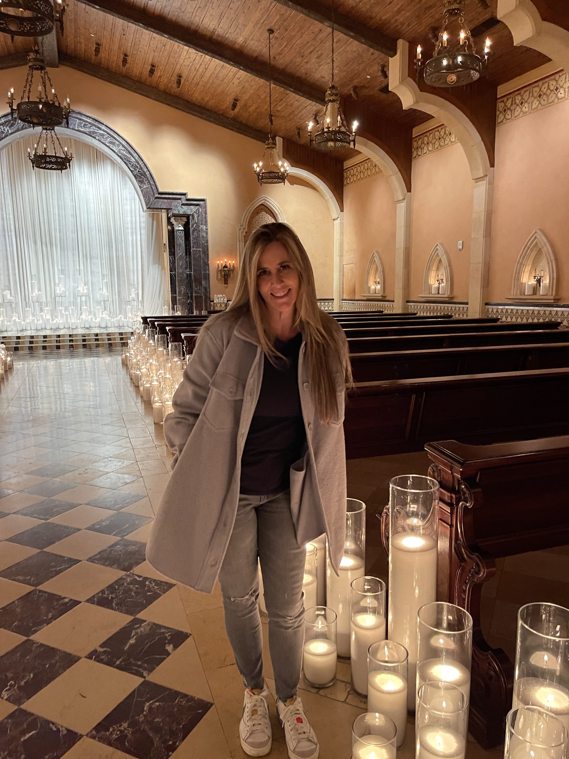 Owner surrounded by Granulated Candle Ceremony Aisle