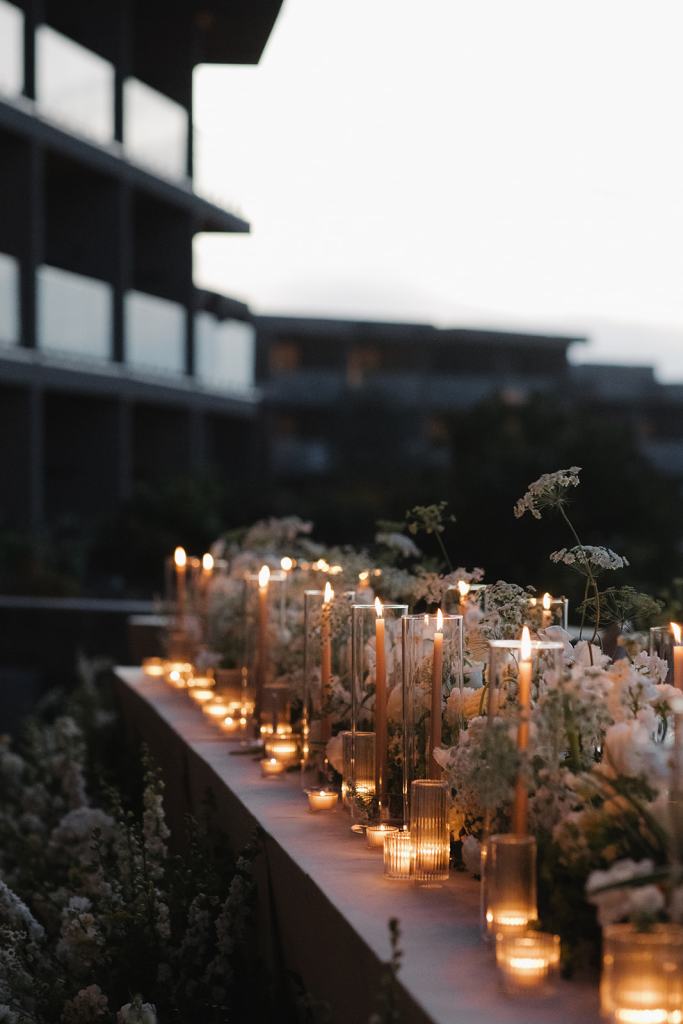 greenery and candles on long table